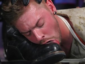 Horny man licks the dominant male's boots before a blissful anal in an unguarded moment
